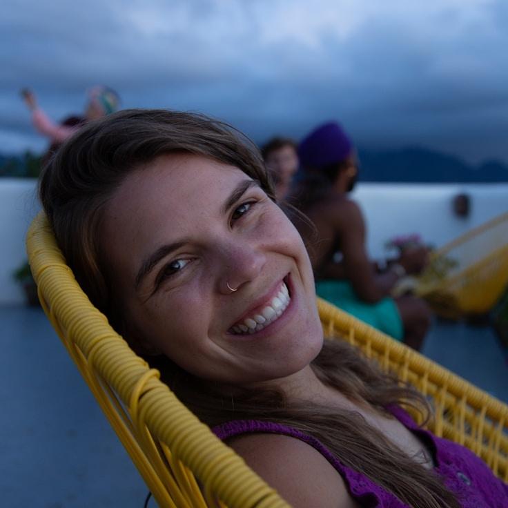 Kaveri Mehta, Lead Design Curator at Kernel Prime Signal, reviewing corporate floral arrangements